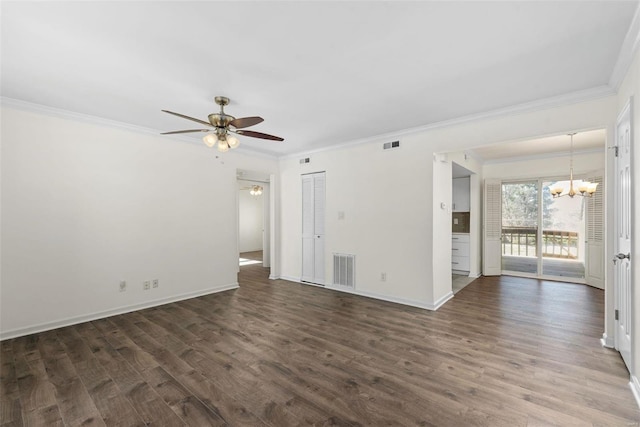 unfurnished room with visible vents, ceiling fan with notable chandelier, dark wood-type flooring, and ornamental molding