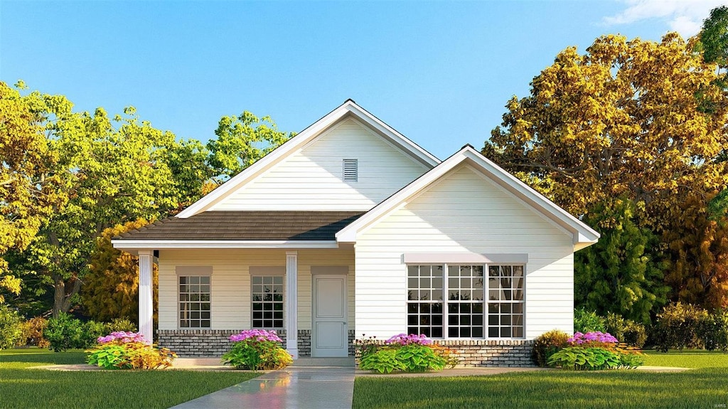 bungalow with brick siding, a front lawn, and a porch