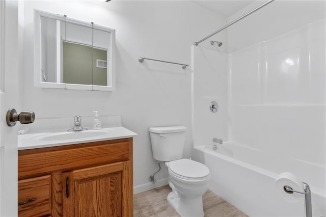 full bathroom with shower / bath combination, vanity, toilet, and baseboards