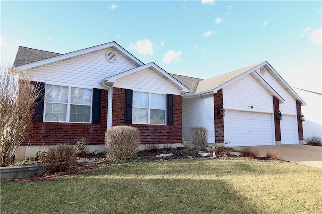 single story home featuring a front yard, a garage, brick siding, and concrete driveway