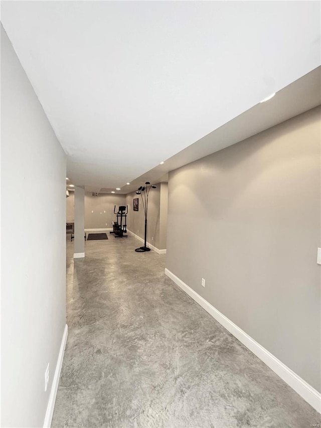 finished basement featuring baseboards