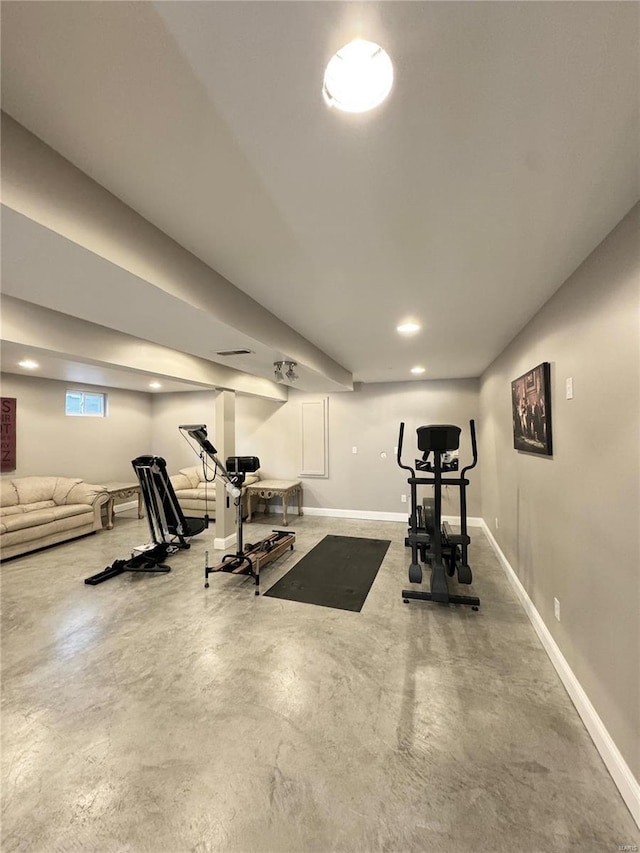 workout area featuring recessed lighting and baseboards