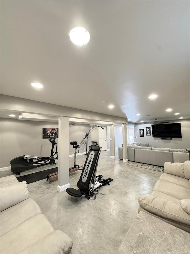 workout room with recessed lighting and baseboards