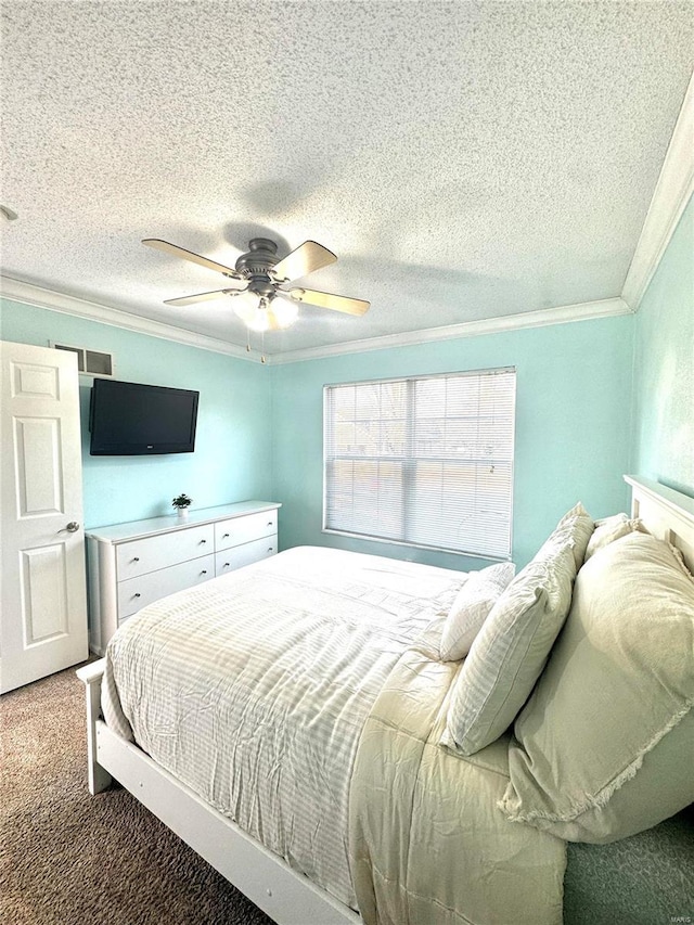 bedroom with carpet, ceiling fan, crown molding, and a textured ceiling