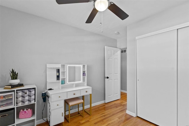 bedroom with visible vents, baseboards, light wood-type flooring, a closet, and a ceiling fan