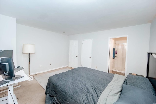 carpeted bedroom with baseboards