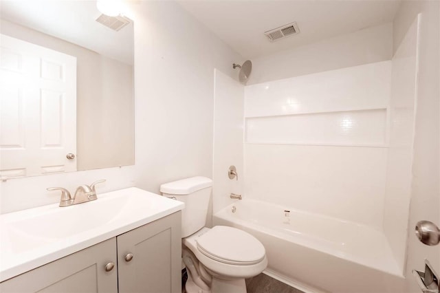 bathroom with toilet, tub / shower combination, vanity, and visible vents