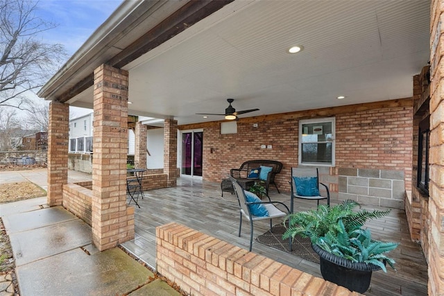 wooden deck with ceiling fan