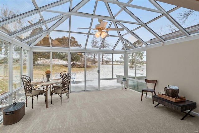 sunroom / solarium featuring vaulted ceiling and ceiling fan