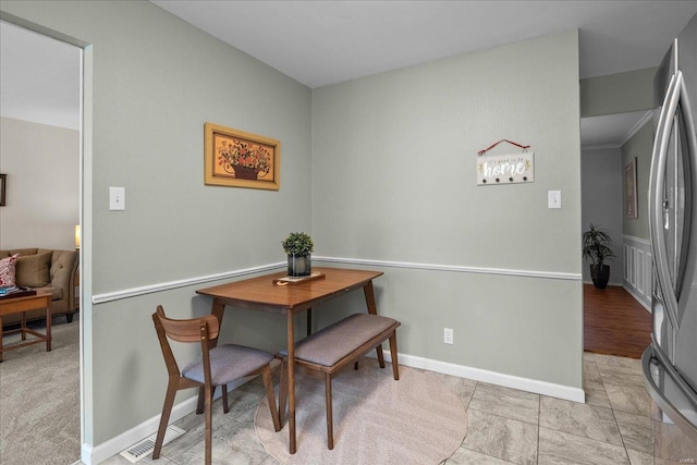 dining room with baseboards