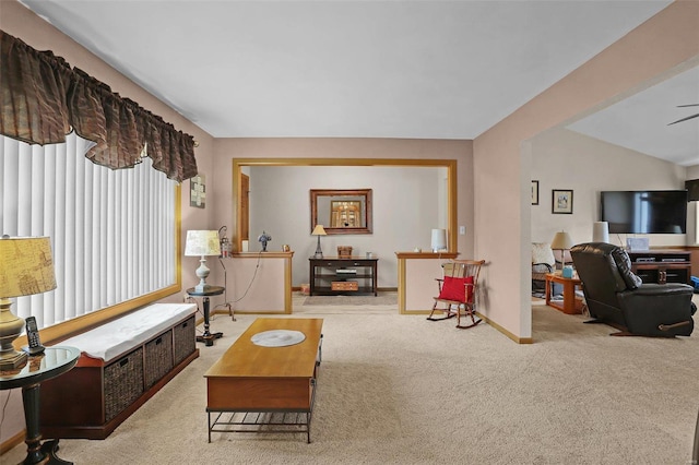 living room with carpet and baseboards