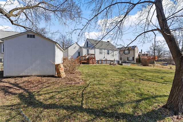 view of yard with an outdoor structure