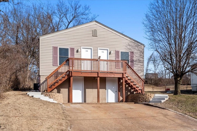 view of front of home with stairway