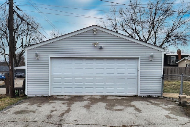 garage with fence