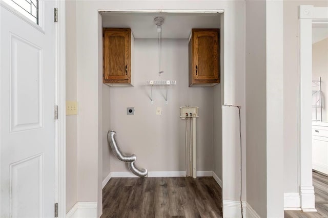 laundry area featuring cabinet space, washer hookup, electric dryer hookup, and wood finished floors