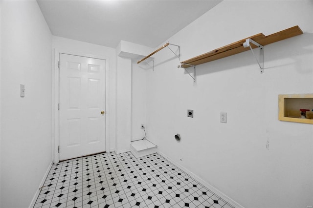 clothes washing area featuring laundry area, baseboards, hookup for a washing machine, light floors, and electric dryer hookup