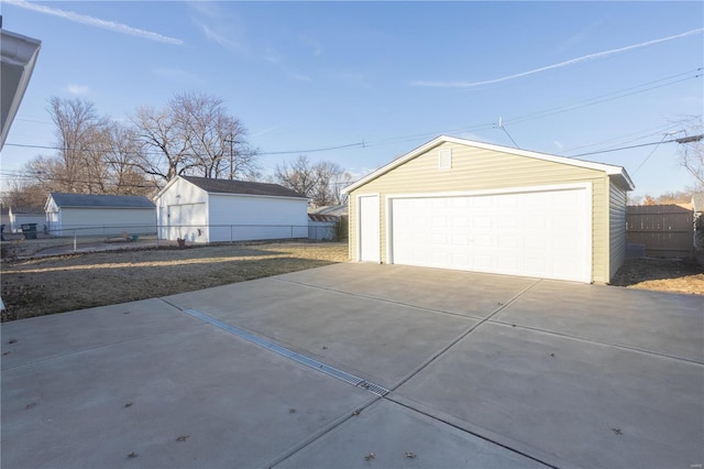 detached garage with fence