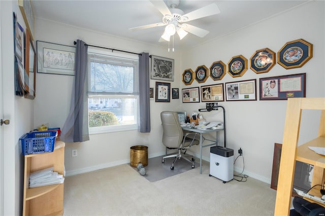 home office featuring ceiling fan, carpet floors, and baseboards