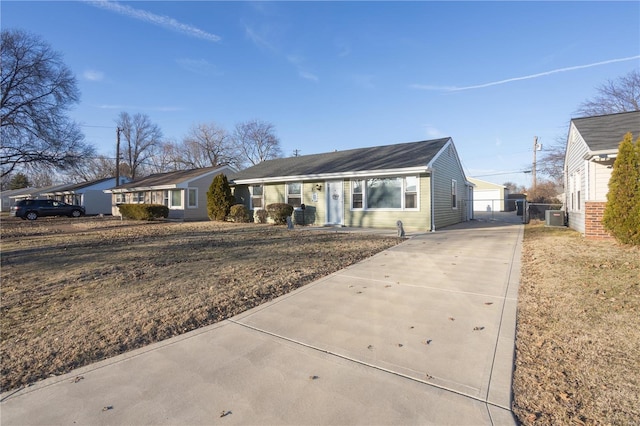 view of front of property with concrete driveway