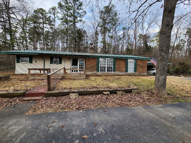 view of front of property featuring metal roof