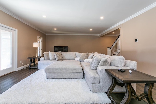 living area featuring recessed lighting, dark wood-style flooring, baseboards, stairs, and crown molding