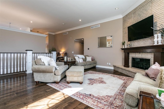 living area featuring visible vents and wood finished floors