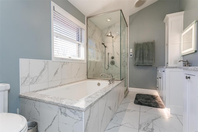 bathroom featuring marble finish floor, a garden tub, a marble finish shower, toilet, and vanity