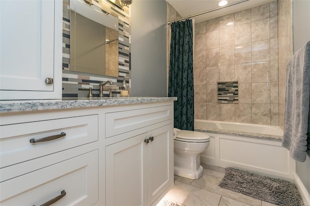 bathroom featuring toilet, tile patterned flooring, shower / bath combo with shower curtain, and vanity