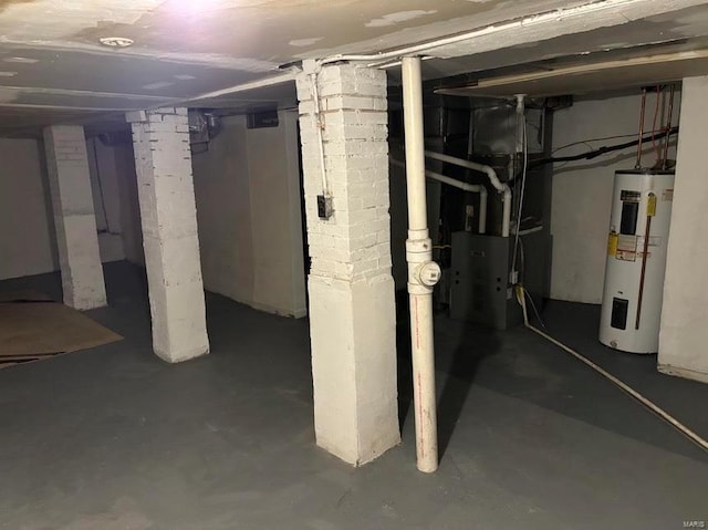 unfinished below grade area with water heater and heating unit