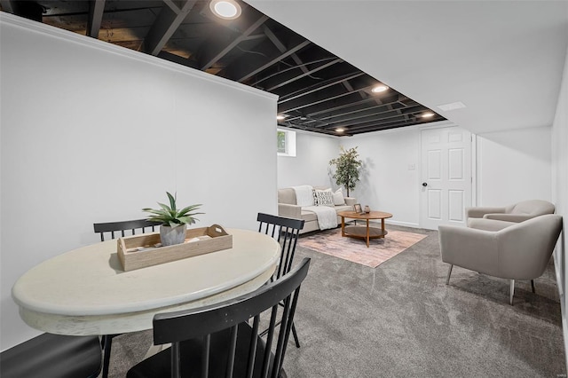 dining space featuring carpet