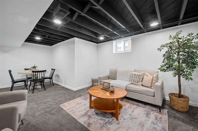 living room with baseboards and carpet