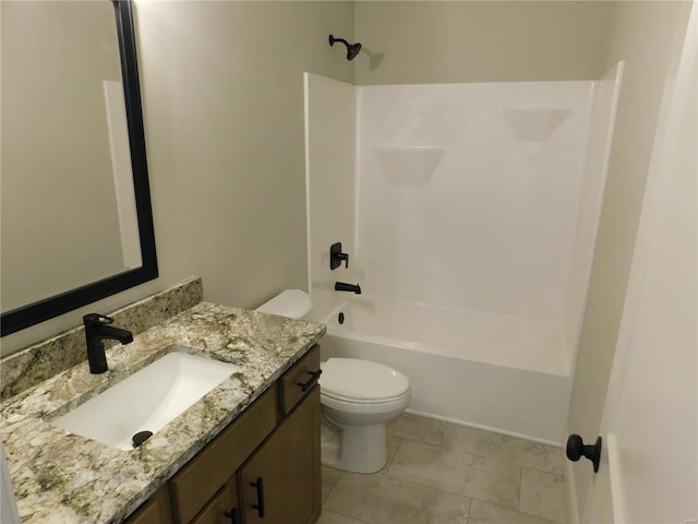 bathroom featuring bathtub / shower combination, vanity, and toilet