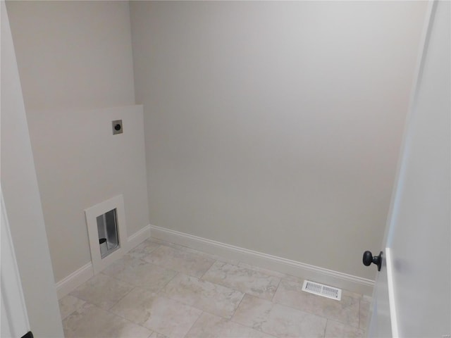 washroom with marble finish floor, visible vents, hookup for an electric dryer, laundry area, and baseboards