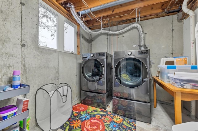 washroom with laundry area and washing machine and clothes dryer