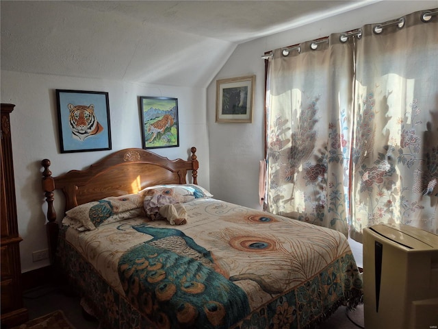 bedroom with vaulted ceiling