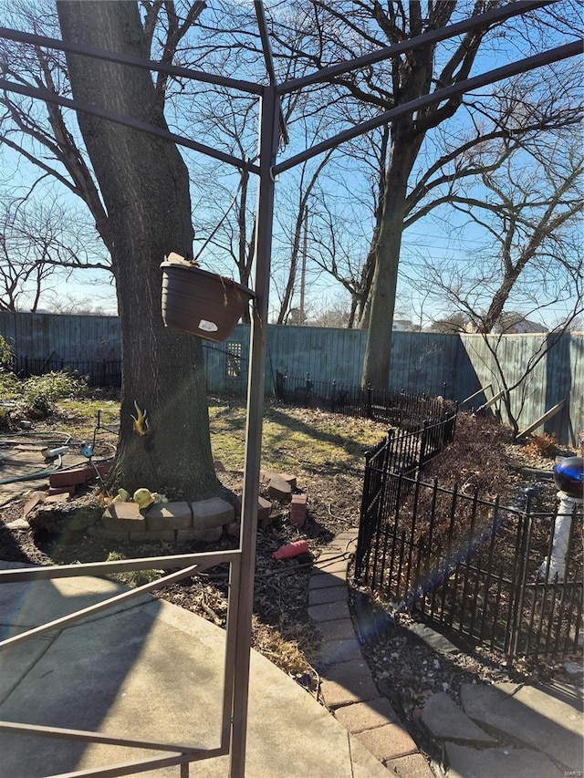 view of yard featuring a fenced backyard