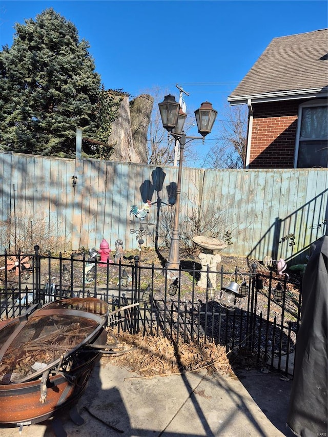 view of patio with fence