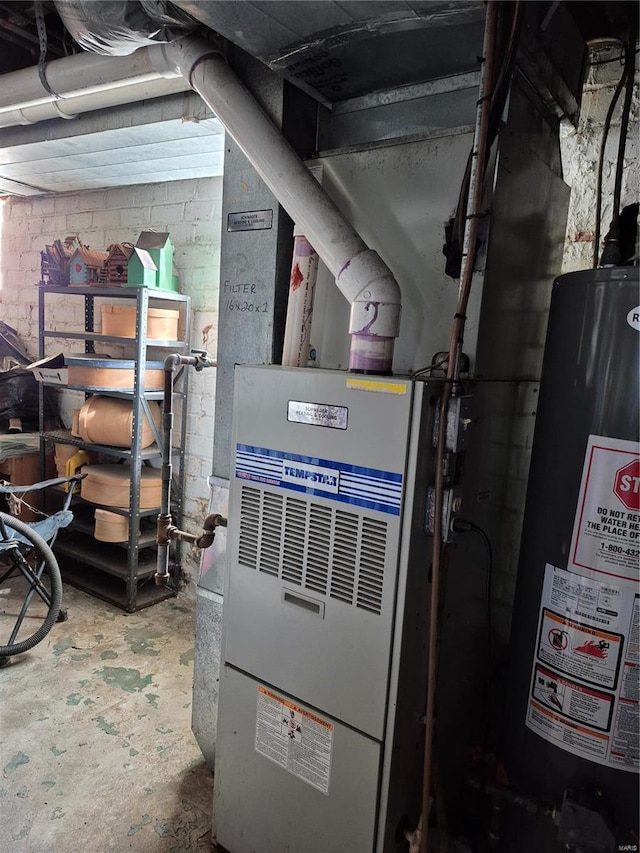 utility room with water heater