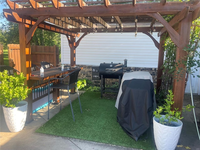 view of yard with fence and a pergola