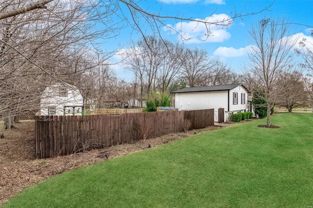 view of yard with fence