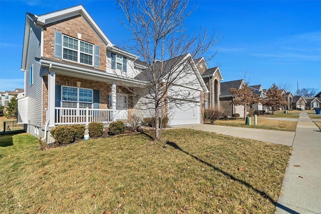 traditional-style home with brick siding, a porch, concrete driveway, a front yard, and a residential view