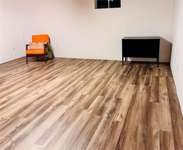 sitting room with wood finished floors