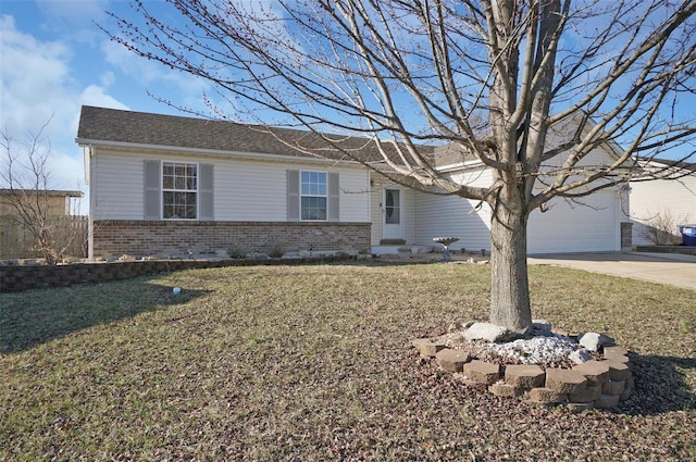 ranch-style home featuring a front yard, brick siding, an attached garage, and driveway