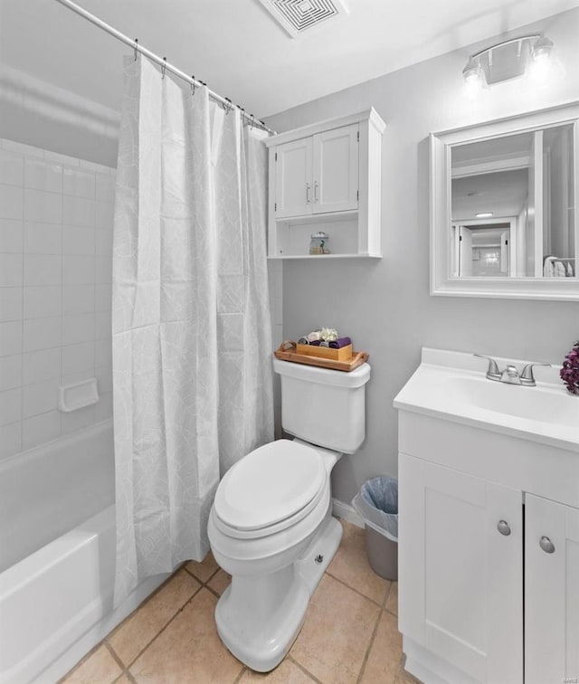 full bath featuring vanity, tile patterned floors, toilet, and visible vents