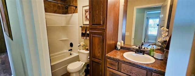 full bathroom featuring shower / bathtub combination, vanity, and toilet