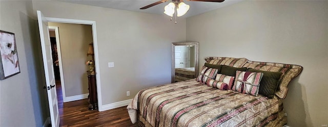 bedroom featuring ceiling fan, wood finished floors, and baseboards