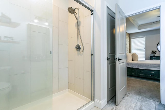 full bath featuring a stall shower, connected bathroom, and crown molding