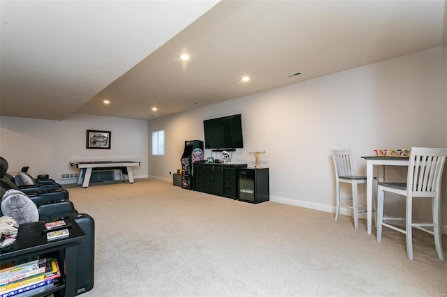 carpeted living room with baseboards and recessed lighting