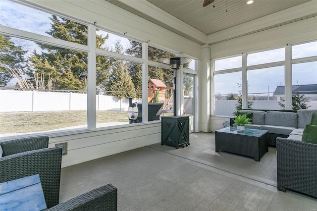 sunroom / solarium with ceiling fan