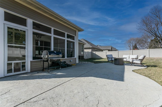 view of patio featuring a fenced backyard and area for grilling